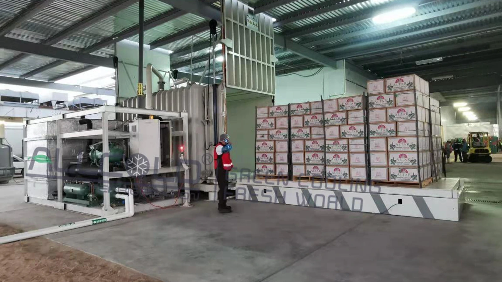Real Allcold fresh-produce vacuum cooler installation with packed pallets positioned on the loading platform