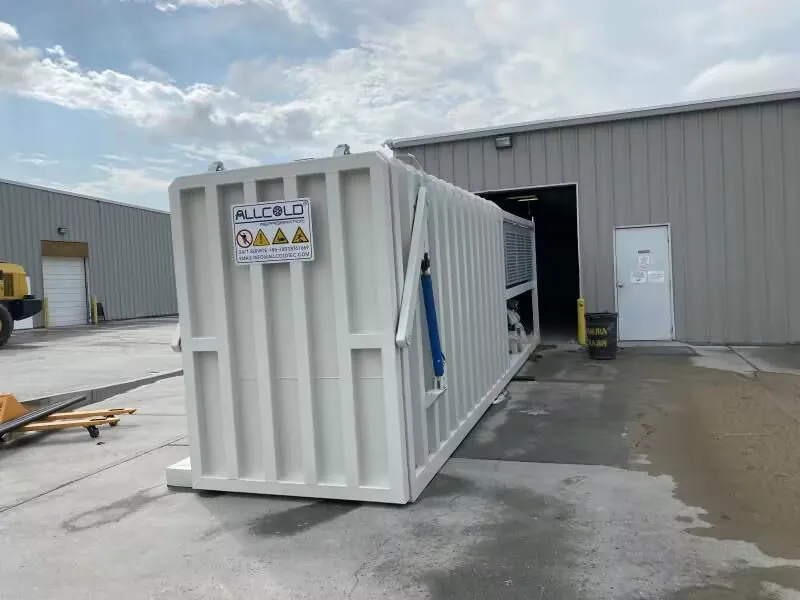 Allcold outdoor vacuum cooling unit installed at a food processing facility, designed for post-harvest cooling of vegetables and produce.