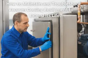 Technician maintaining vacuum cooling equipment